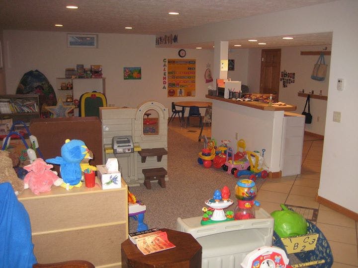 Playroom with various toys and play structures