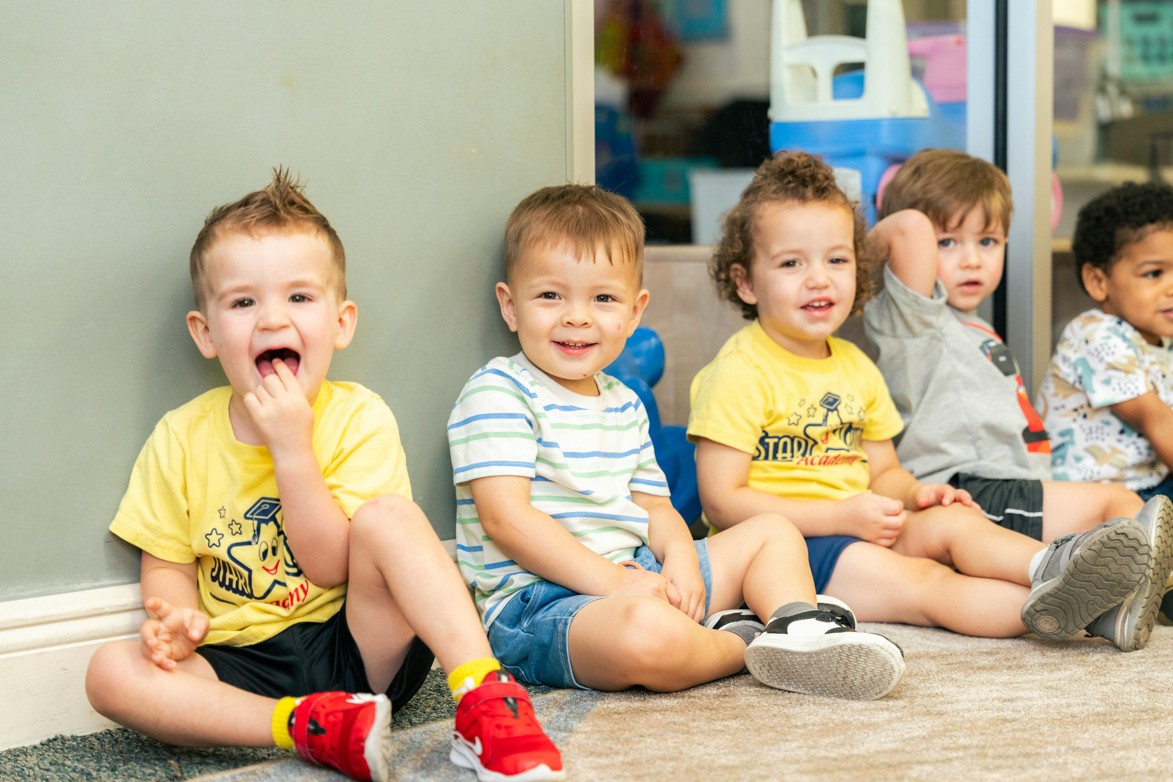 Group of children sitting on the floor