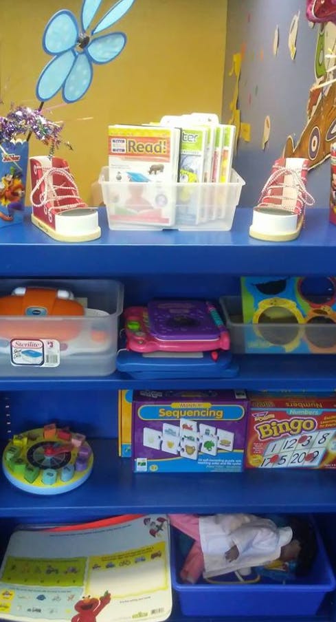 Shelves with various toys and learning materials