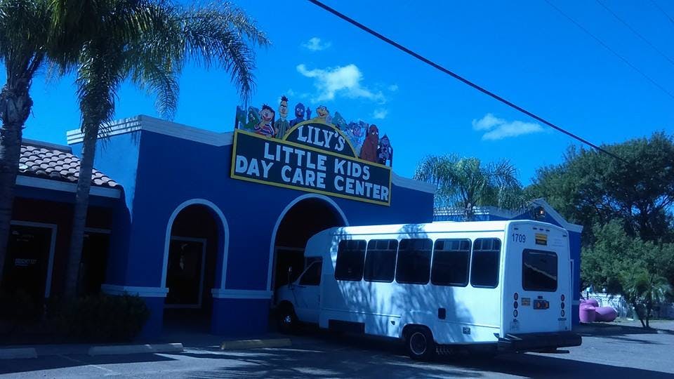 Daycare center building with a bus parked in front