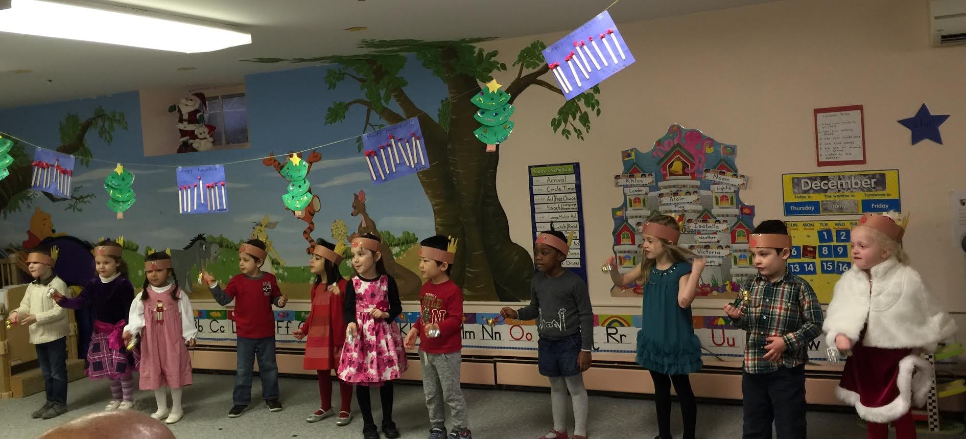 Children standing in a line in a classroom