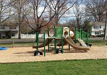 Empty playground with slides and climbing structures