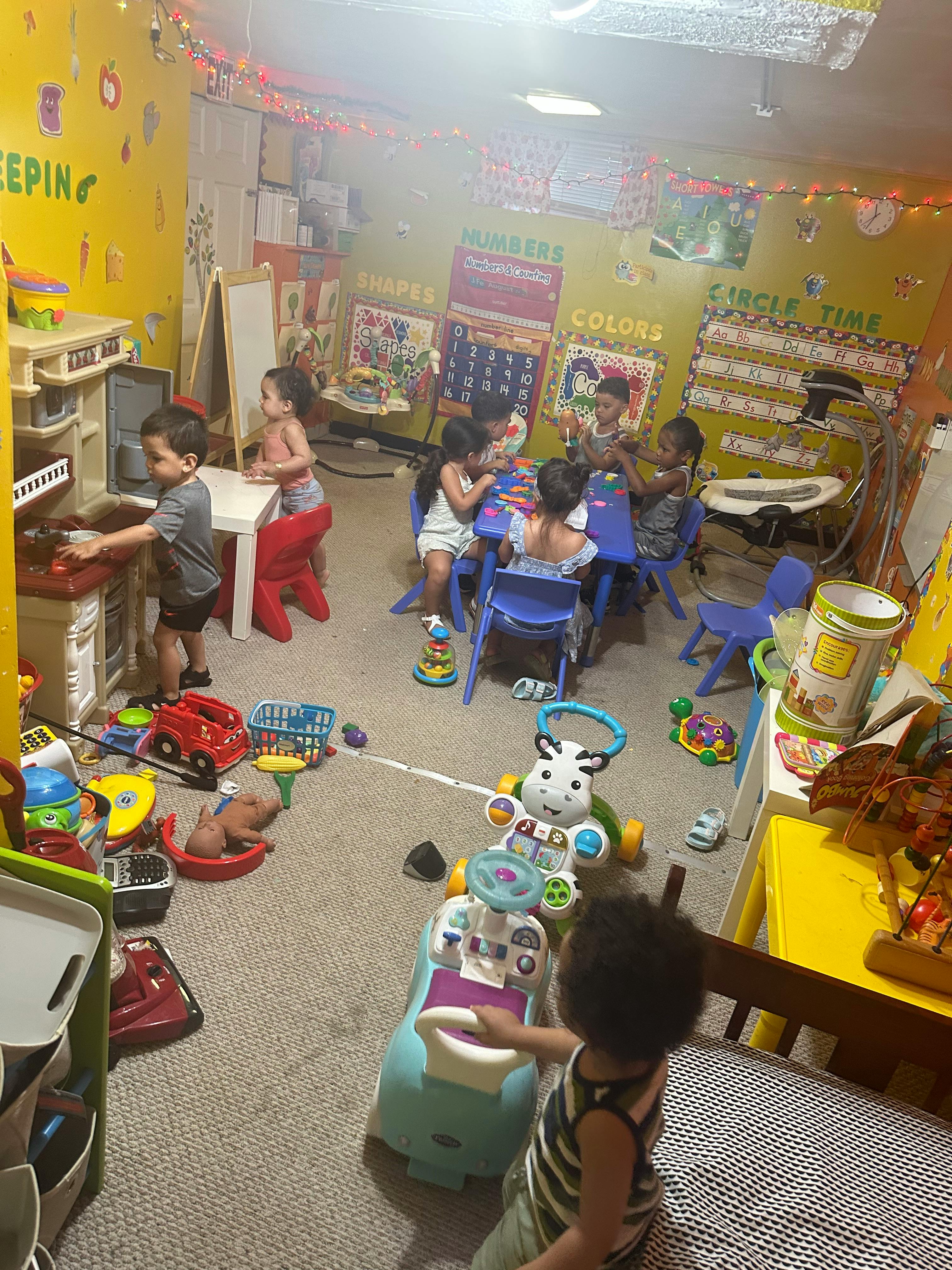 Children playing with toys in a room