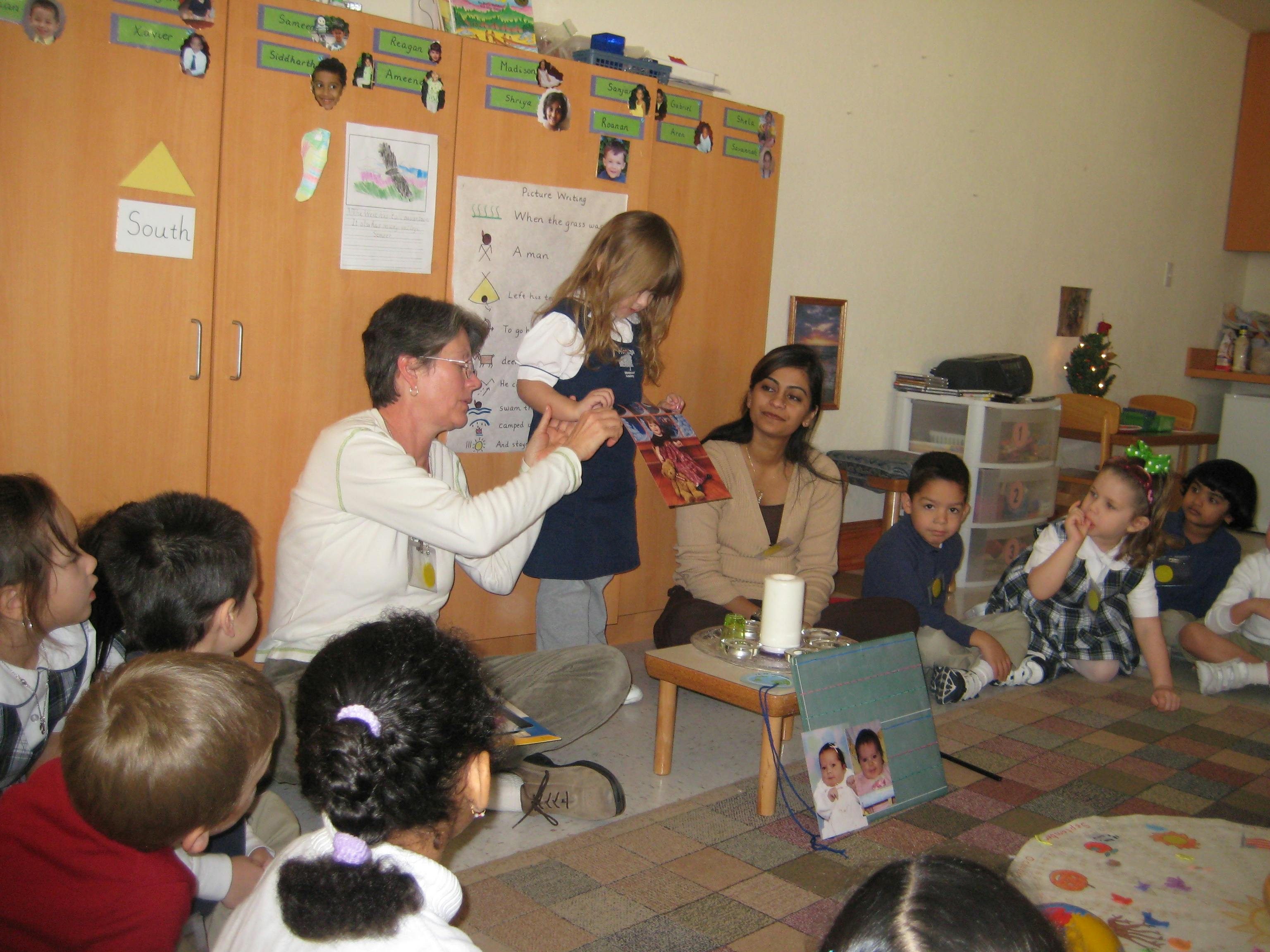 Adults and children in a classroom