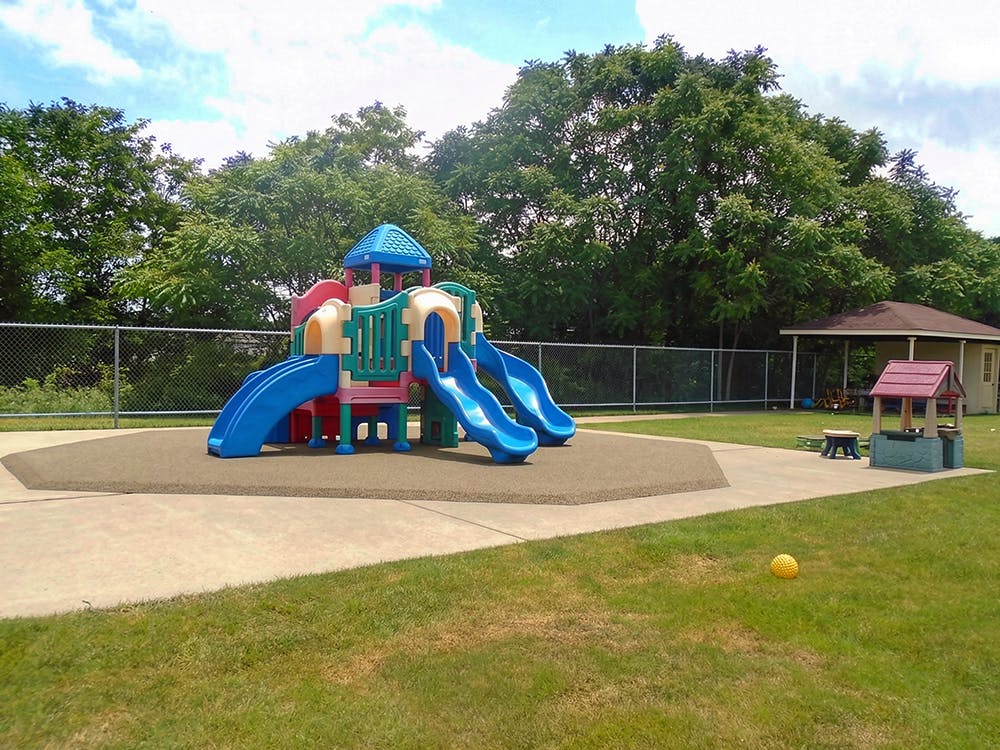Playground with colorful slides and climbing structures