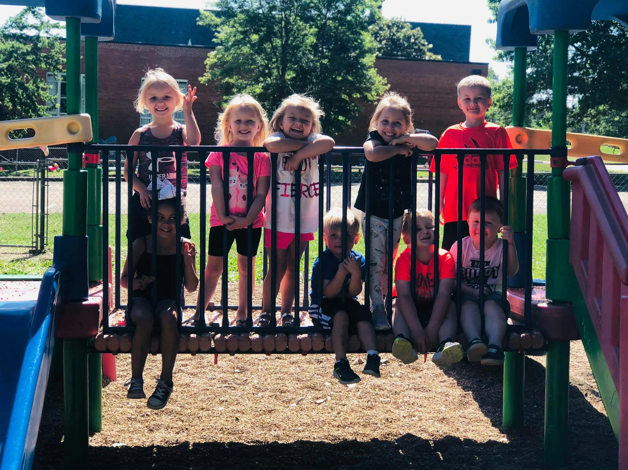 Group of children on a playground structure
