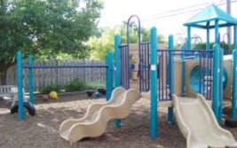 Playground with slides and climbing structures