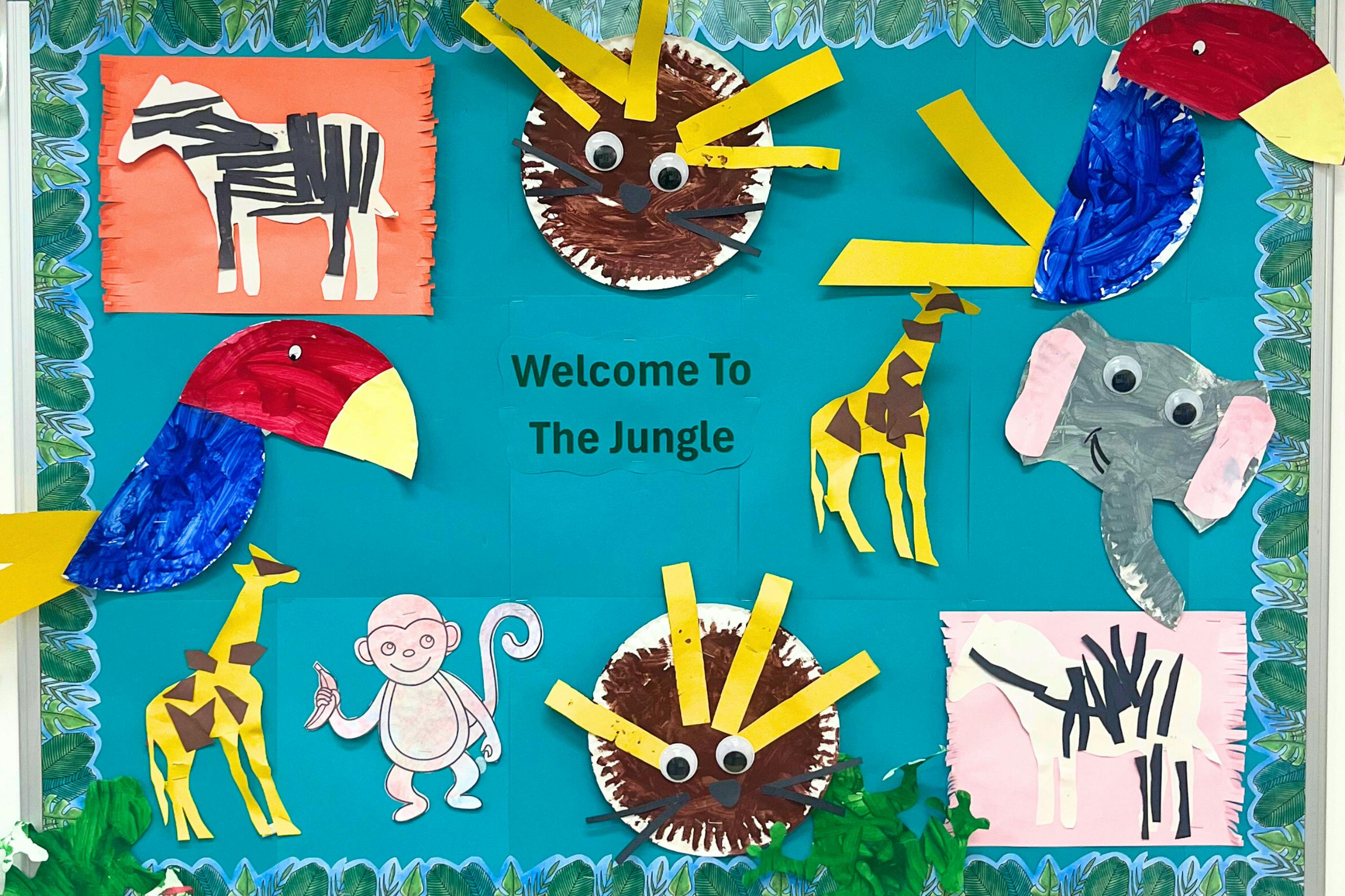 Children's artwork of jungle animals and "Welcome To The Jungle" text