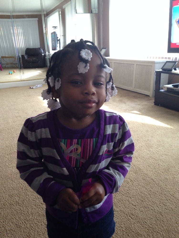 Child with white hair decorations