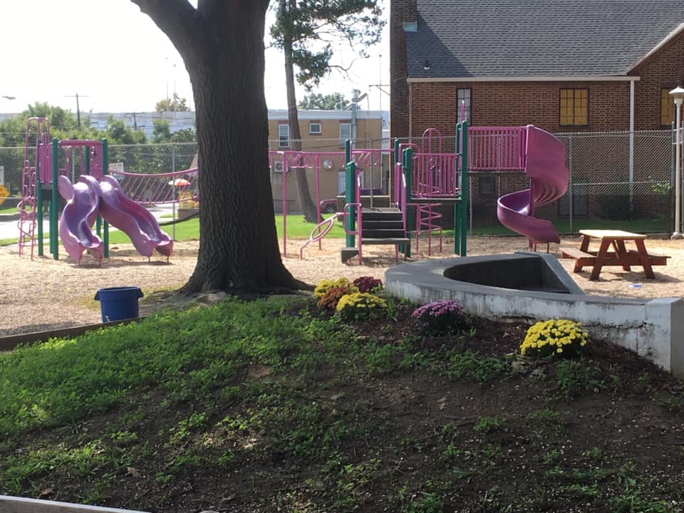 Playground with slides and climbing structures