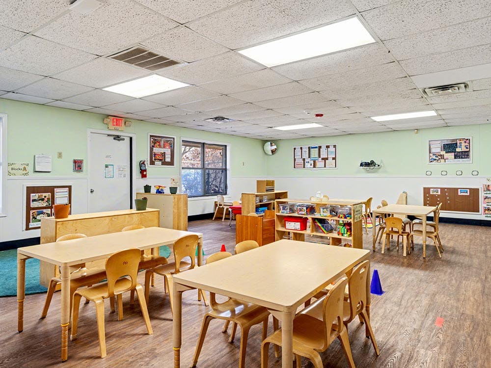 Classroom with small tables and chairs