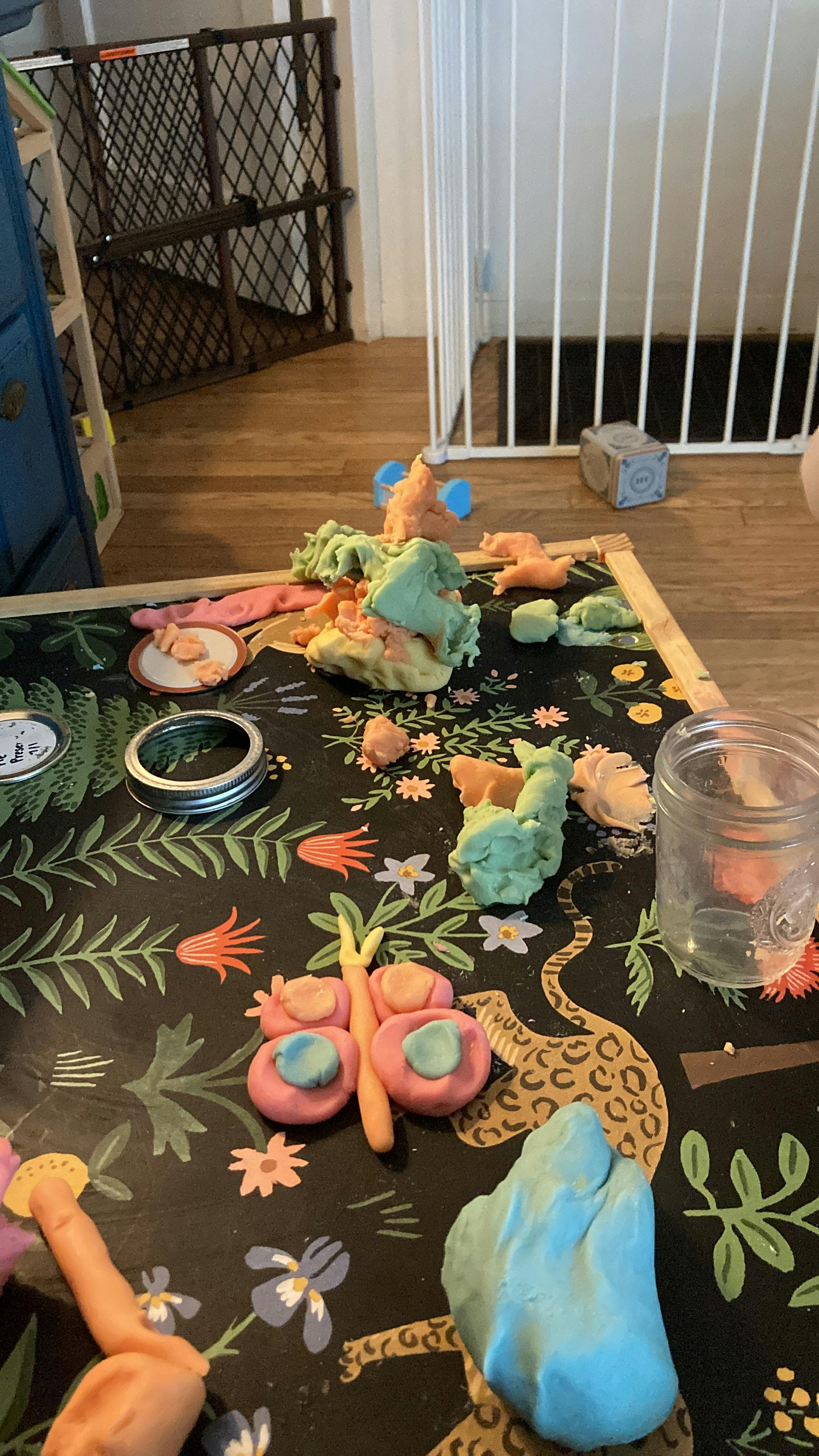 Play-Doh creations on a patterned surface