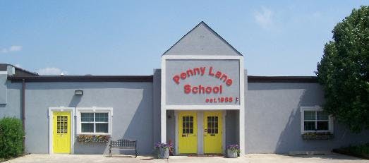 Penny Lane School building with yellow doors