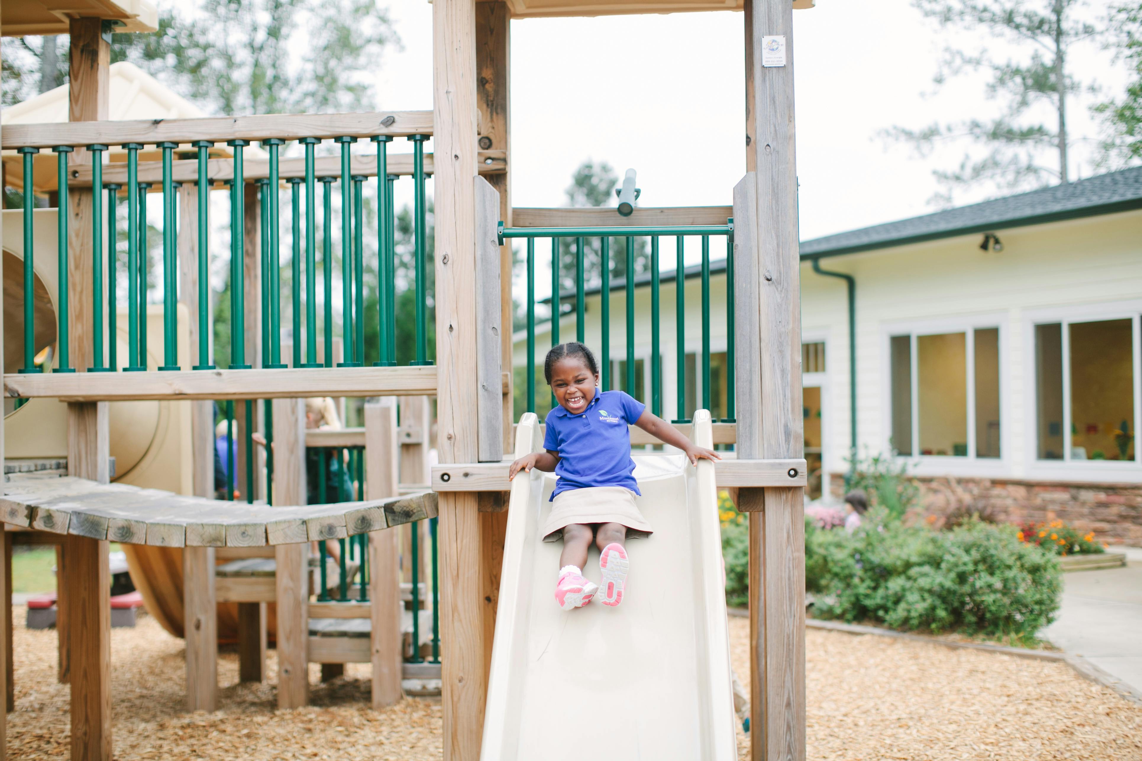 Child on a playground slide