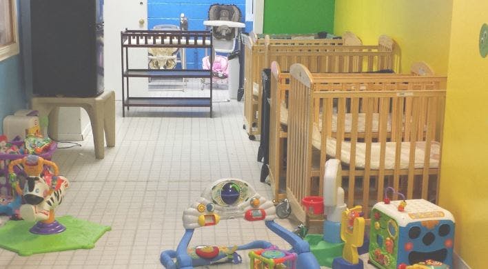 Nursery room with cribs and toys