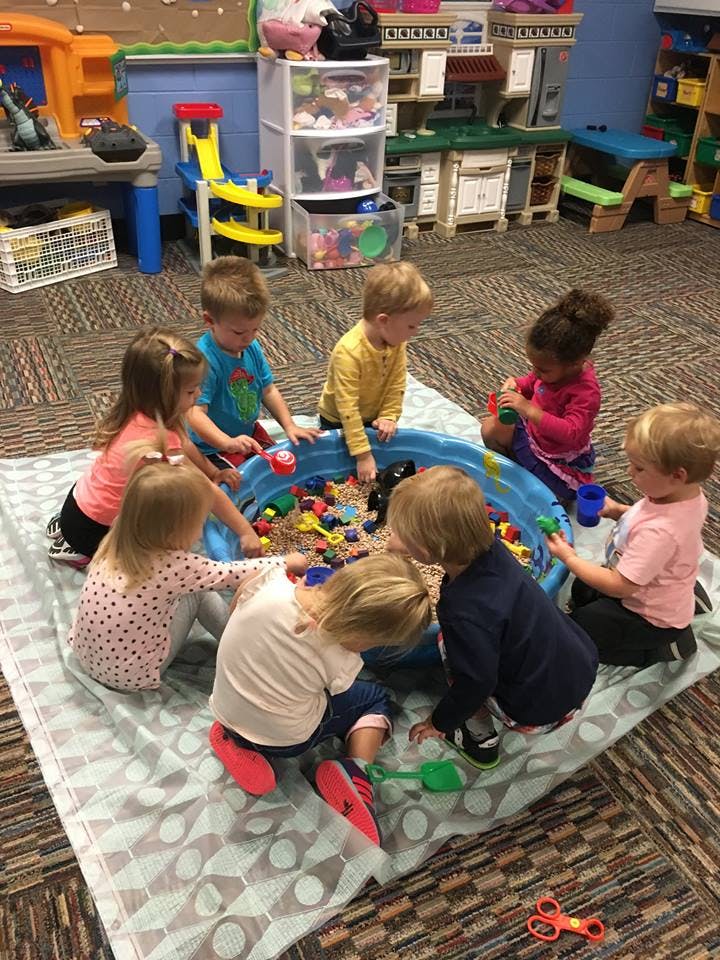 Children playing in a sand pit