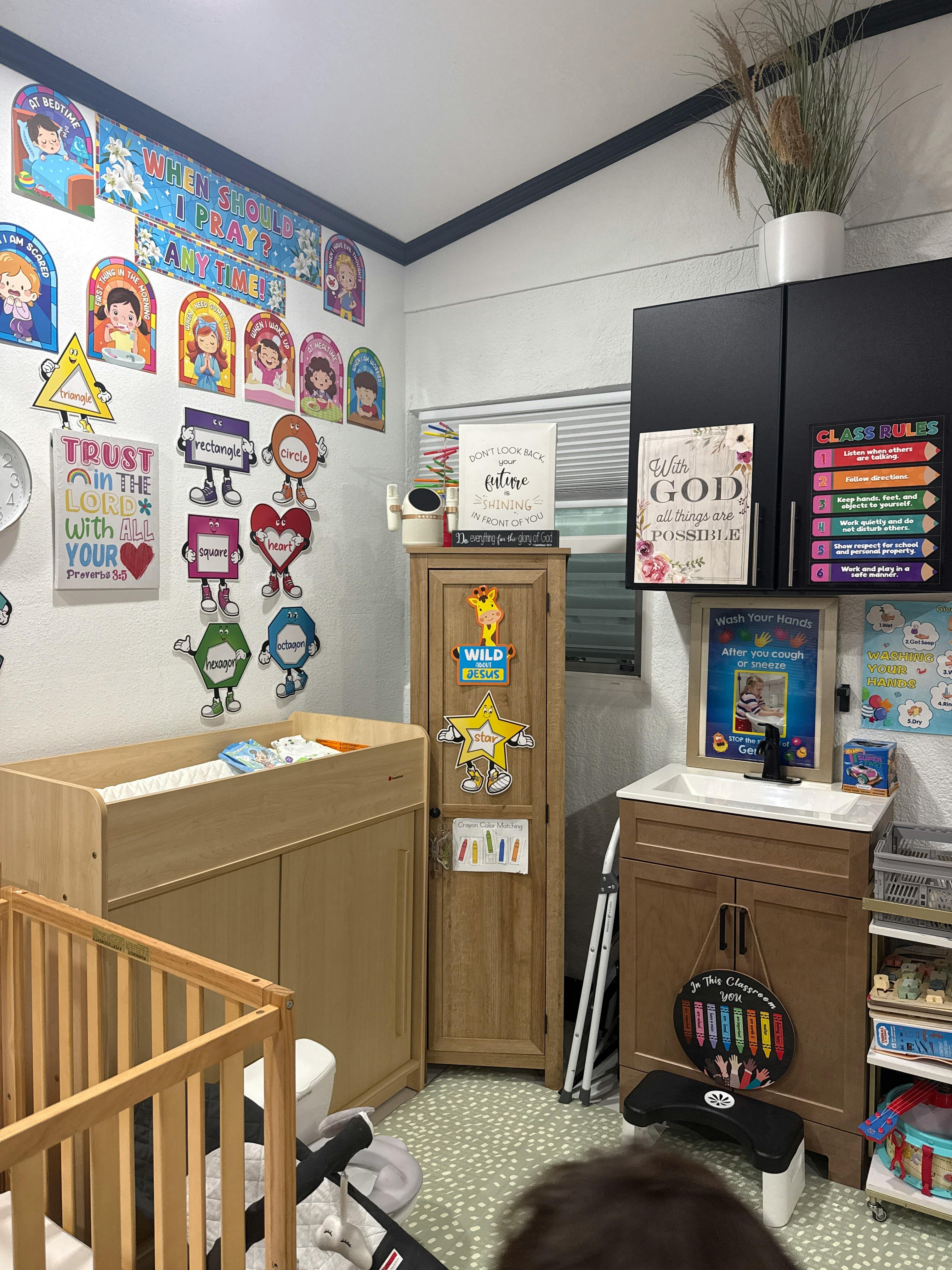Classroom interior with educational posters and wood furniture