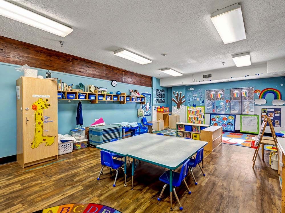 An empty children's classroom with colorful decorations