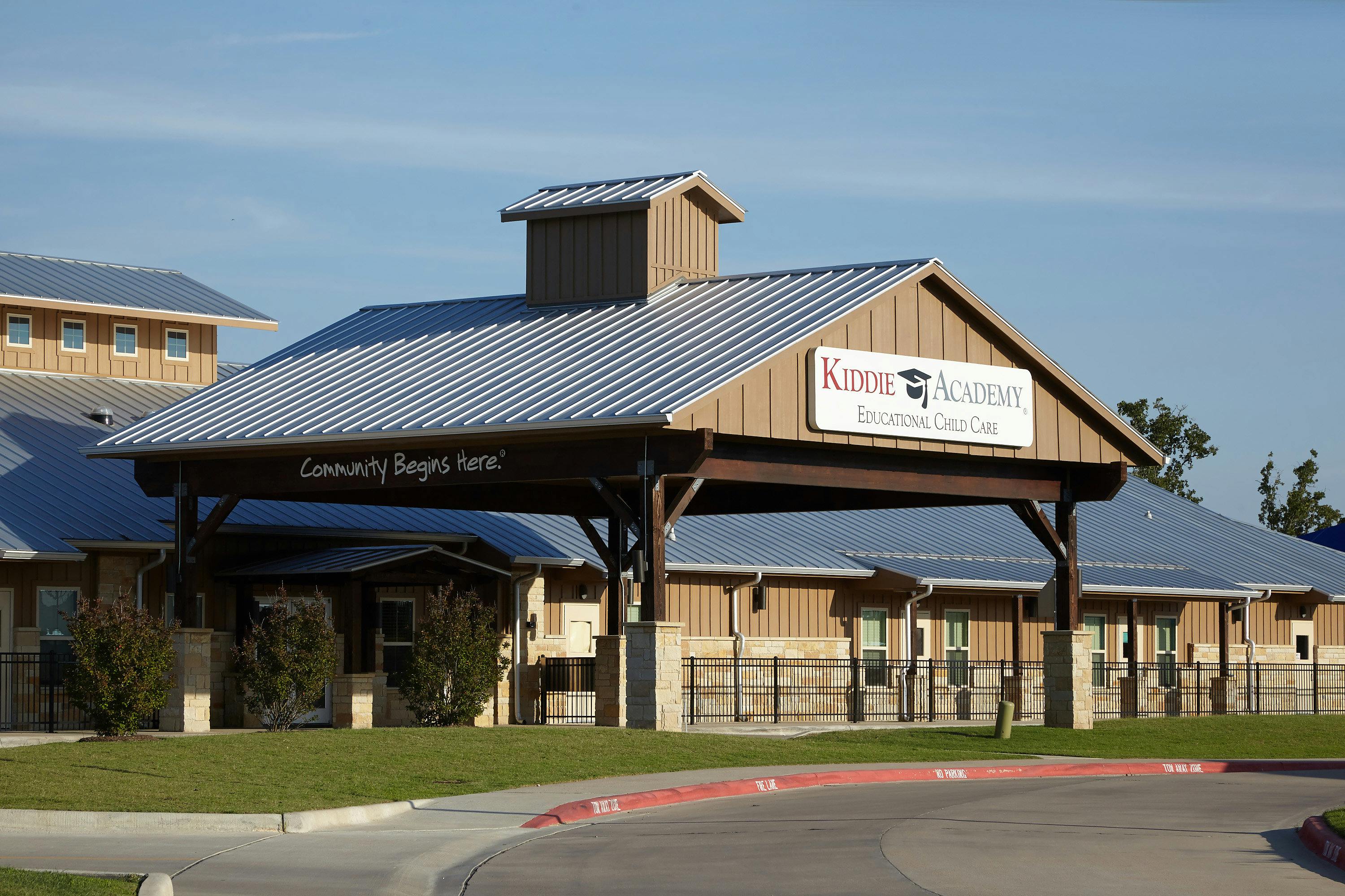 Building with a sign that reads "Kropp Academy"