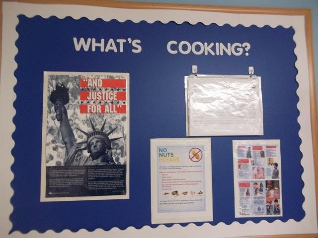 Bulletin board with "What's Cooking?" at the top, and four documents posted documents below