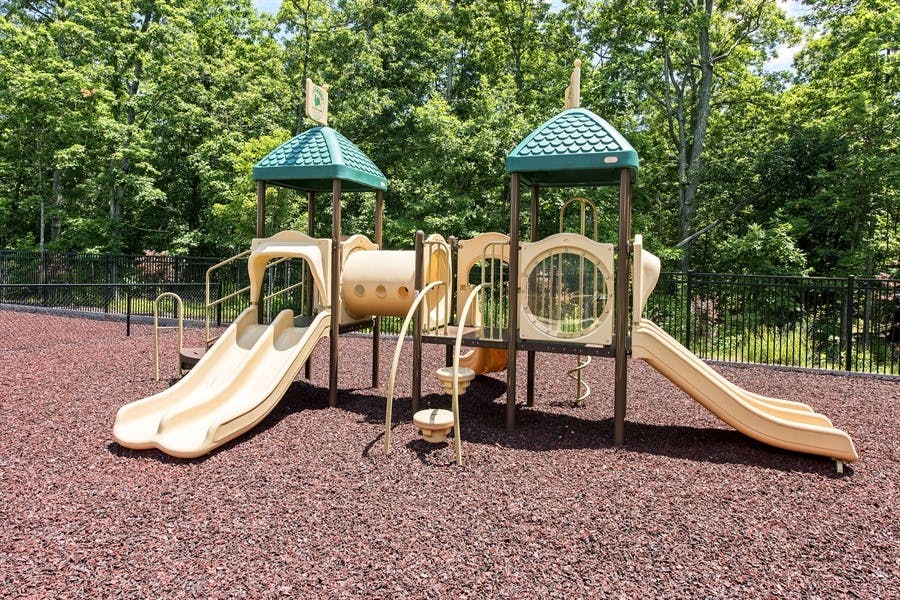 Playground with slides and climbing structures