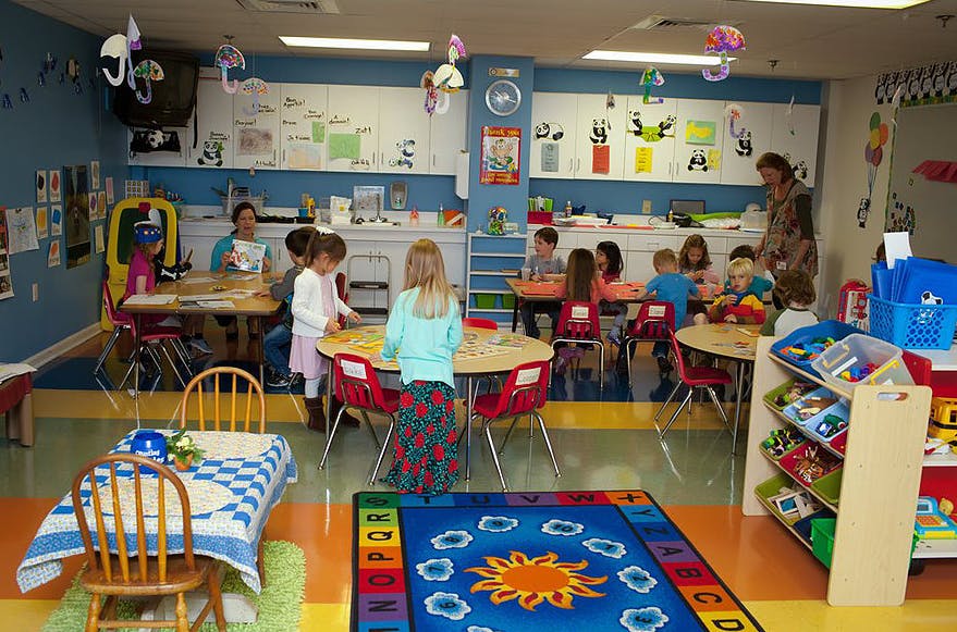 Children and adults in a classroom