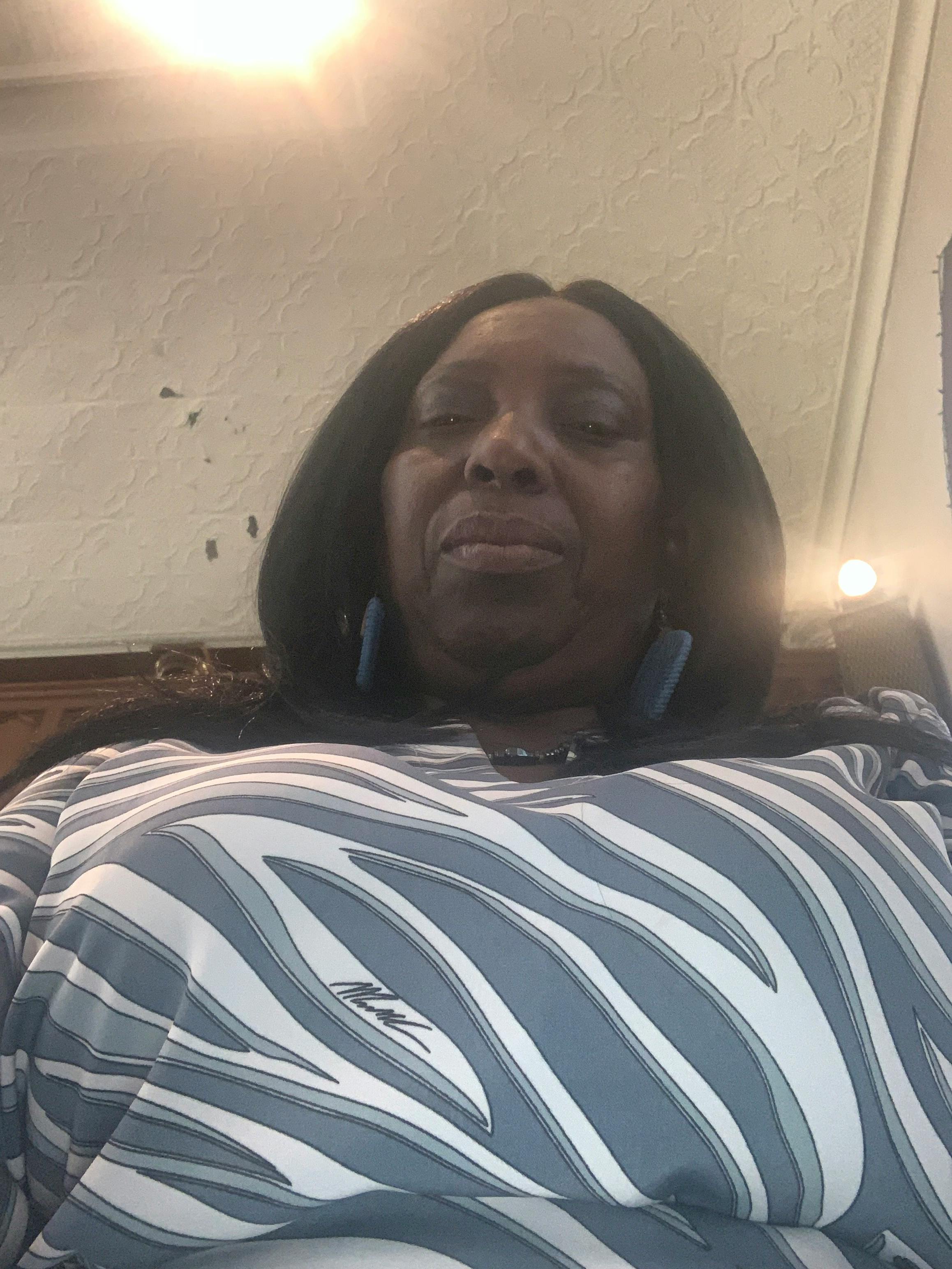 Person wearing a striped shirt