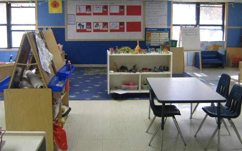 Classroom with child-sized furniture and learning materials