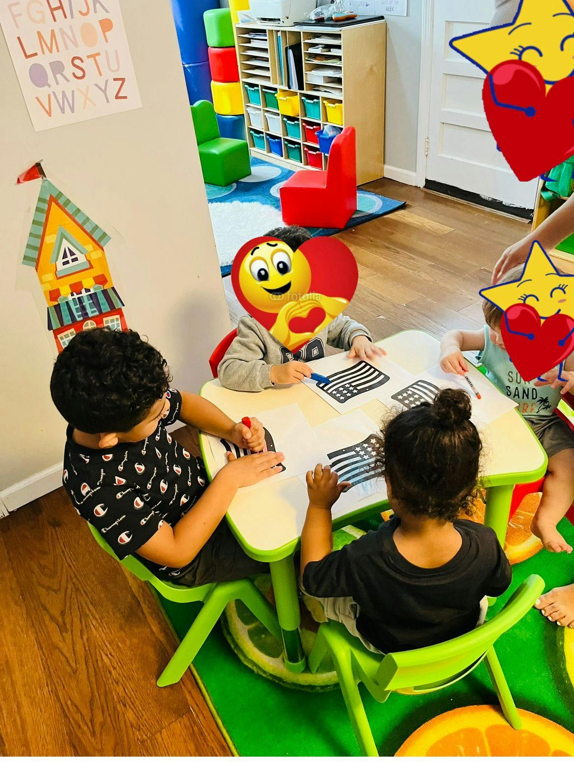 Children sitting at a table with papers