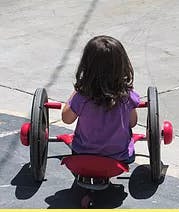 Child on a tricycle