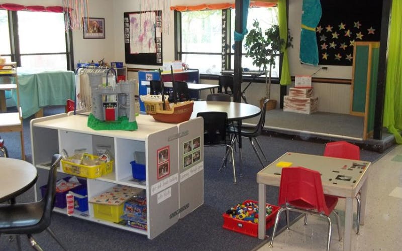 Classroom with toy castle and pirate ship on a shelf