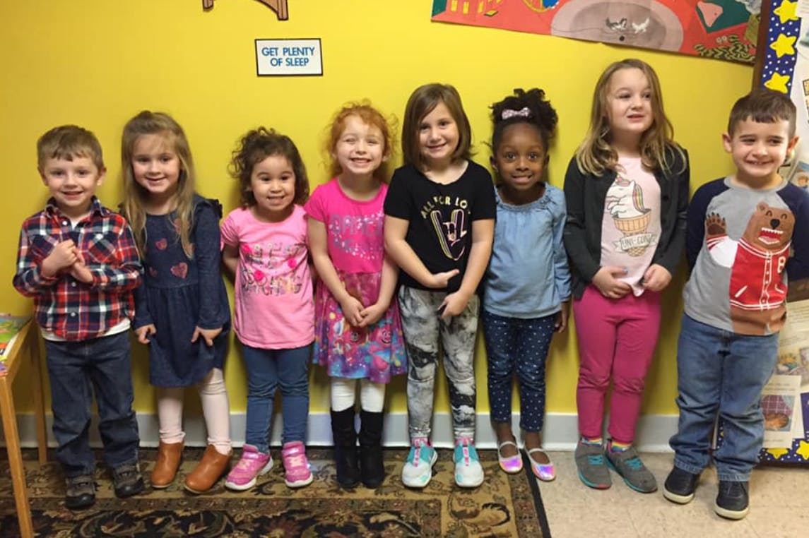 Group of children standing in a line