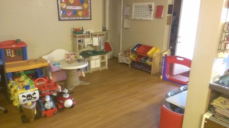 Playroom with various toys and furniture