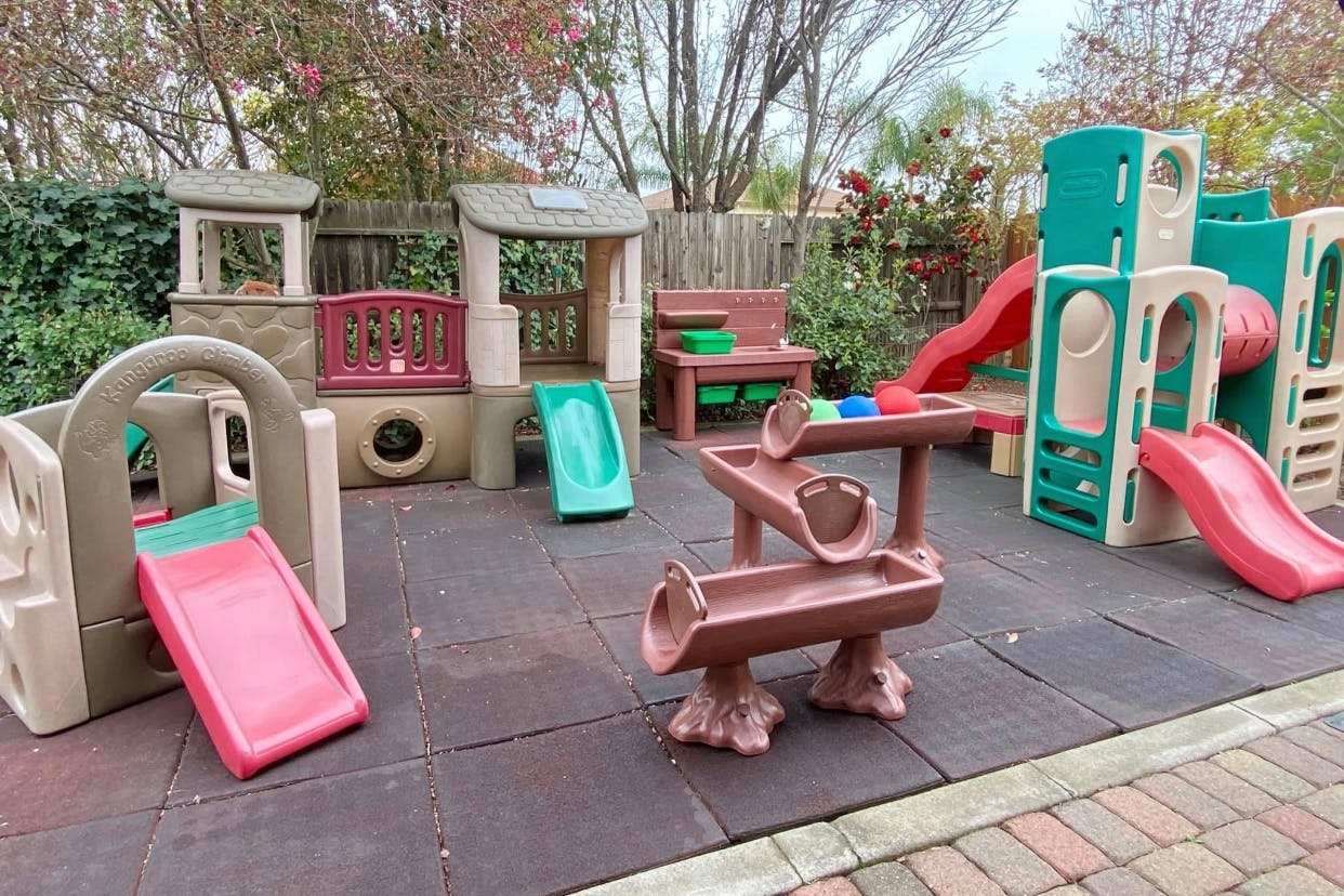 Outdoor playground with multiple slides and play structures