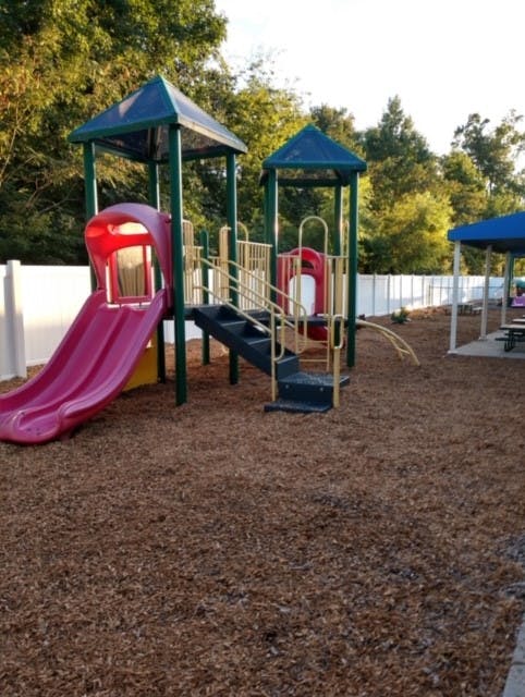 Playground with slides and climbing structures