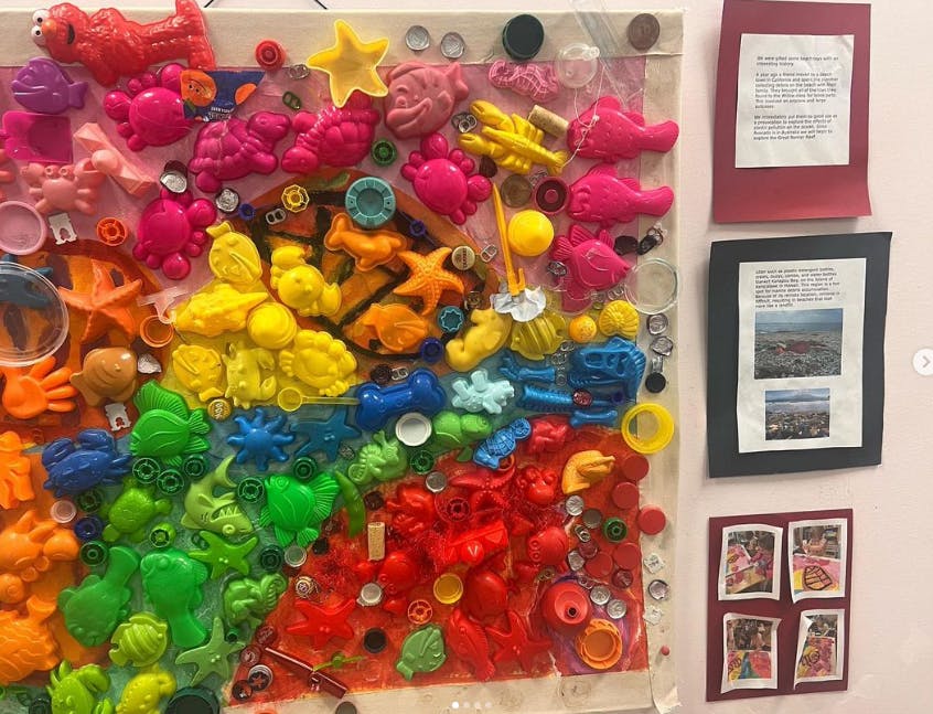 Rainbow-colored collage of plastic objects and toys