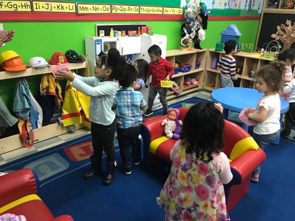Children playing in a classroom