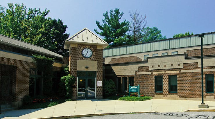 Brick building with a clock tower entrance