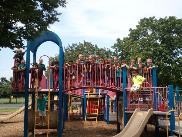 Children on a playground structure