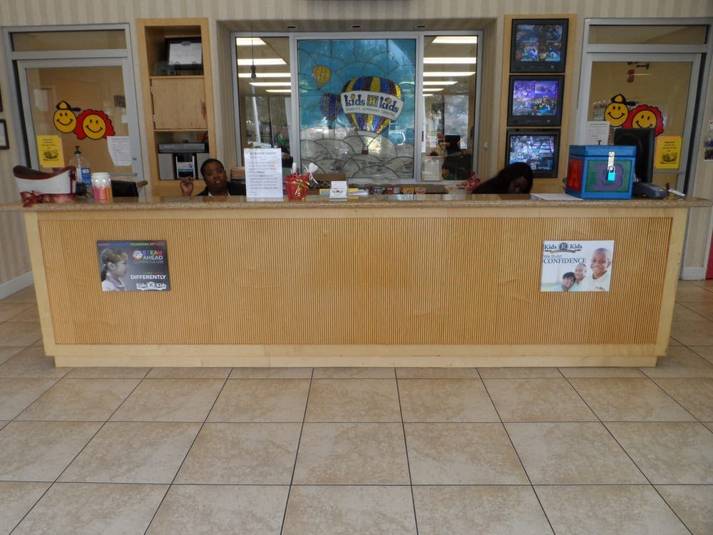 Person behind a reception desk