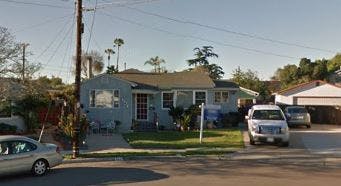 House with a car parked in the driveway