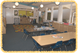 Empty classroom with tables and chairs