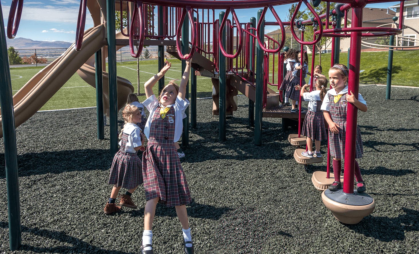 Children playing on playground equipment