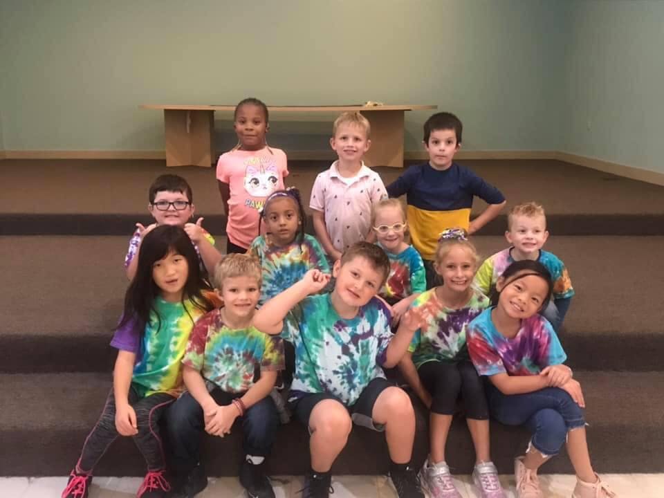 Group of children posing for a photo