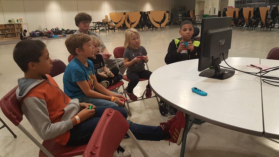 Children playing video games