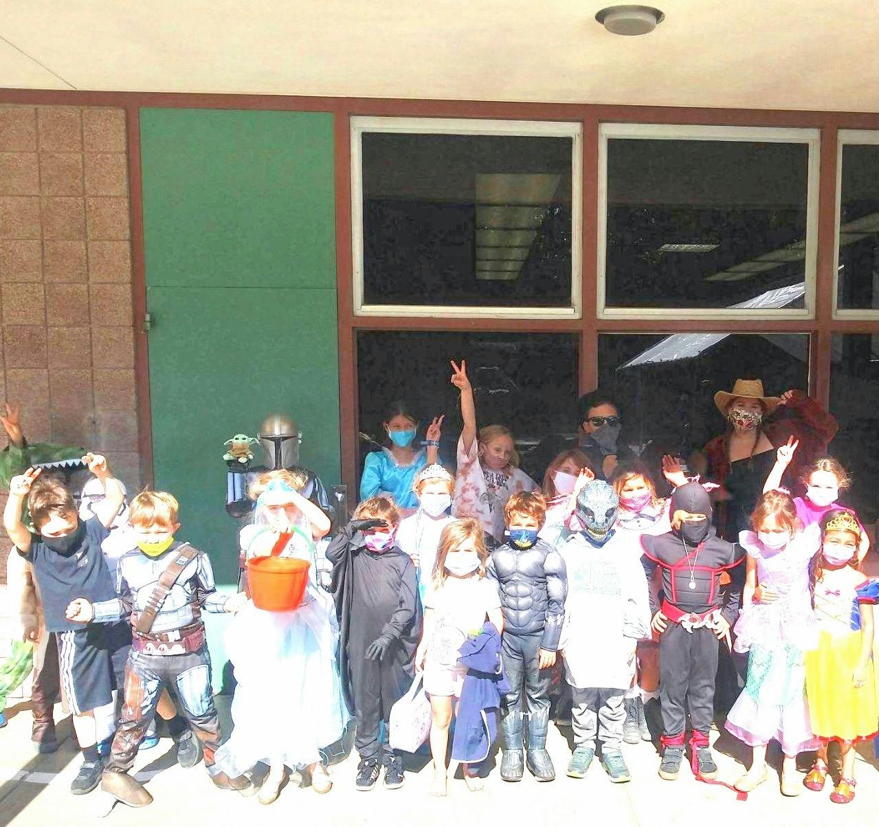 Group of children and adults in costumes