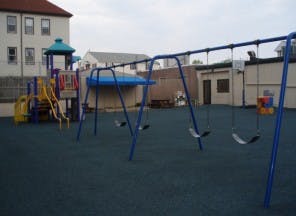 Playground with swings and climbing structure