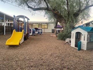 Playground with slide and playhouse