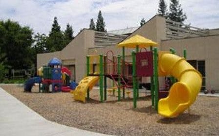 Playground with slides and climbing structures