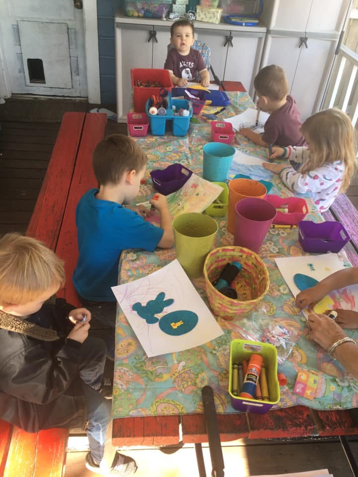 Children doing crafts at a table
